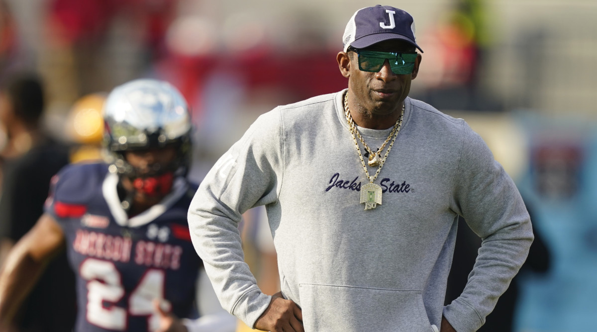 Jackson State coach Deion Sanders watches players preparing for the Southwestern Athletic Conference championship NCAA college football game against Southern, Saturday, Dec. 3, 2022