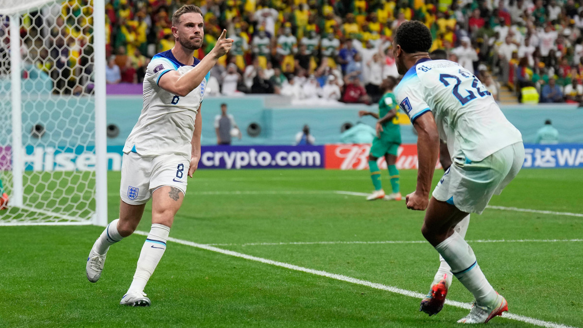 Jordan Henderson celebrates his goal for England with Jude Bellingham