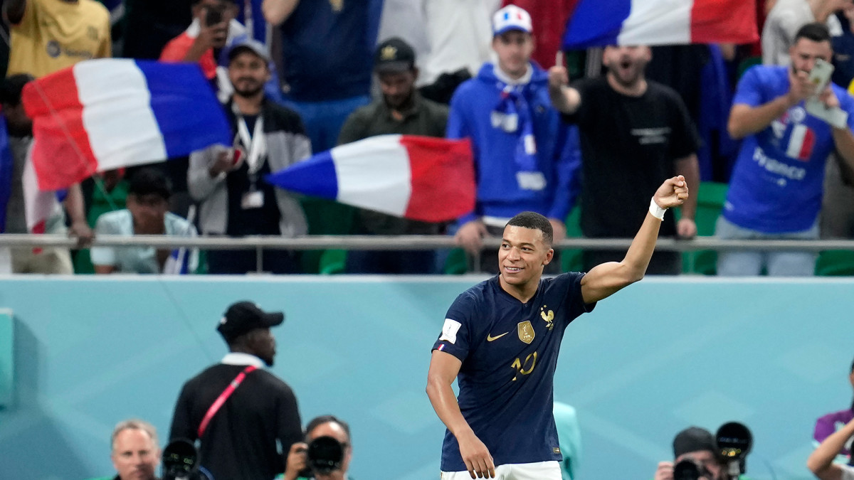 Kylian Mbappe celebrates a goal for France vs Poland