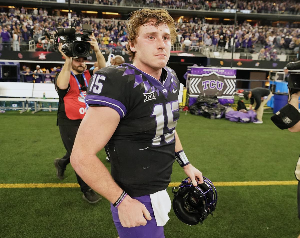 TCU quarterback Max Duggan walks off the field after the Big 12 title game.