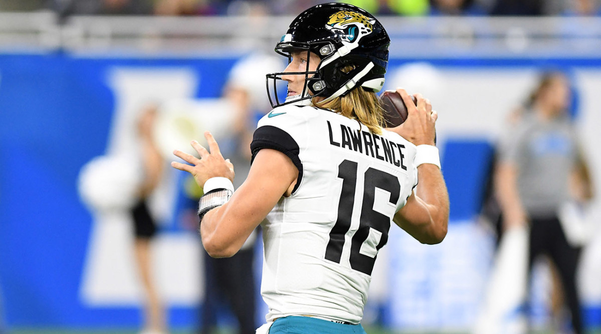 Jacksonville Jaguars quarterback Trevor Lawrence (16) throws against the Detroit Lions in the first quarter at Ford Field.