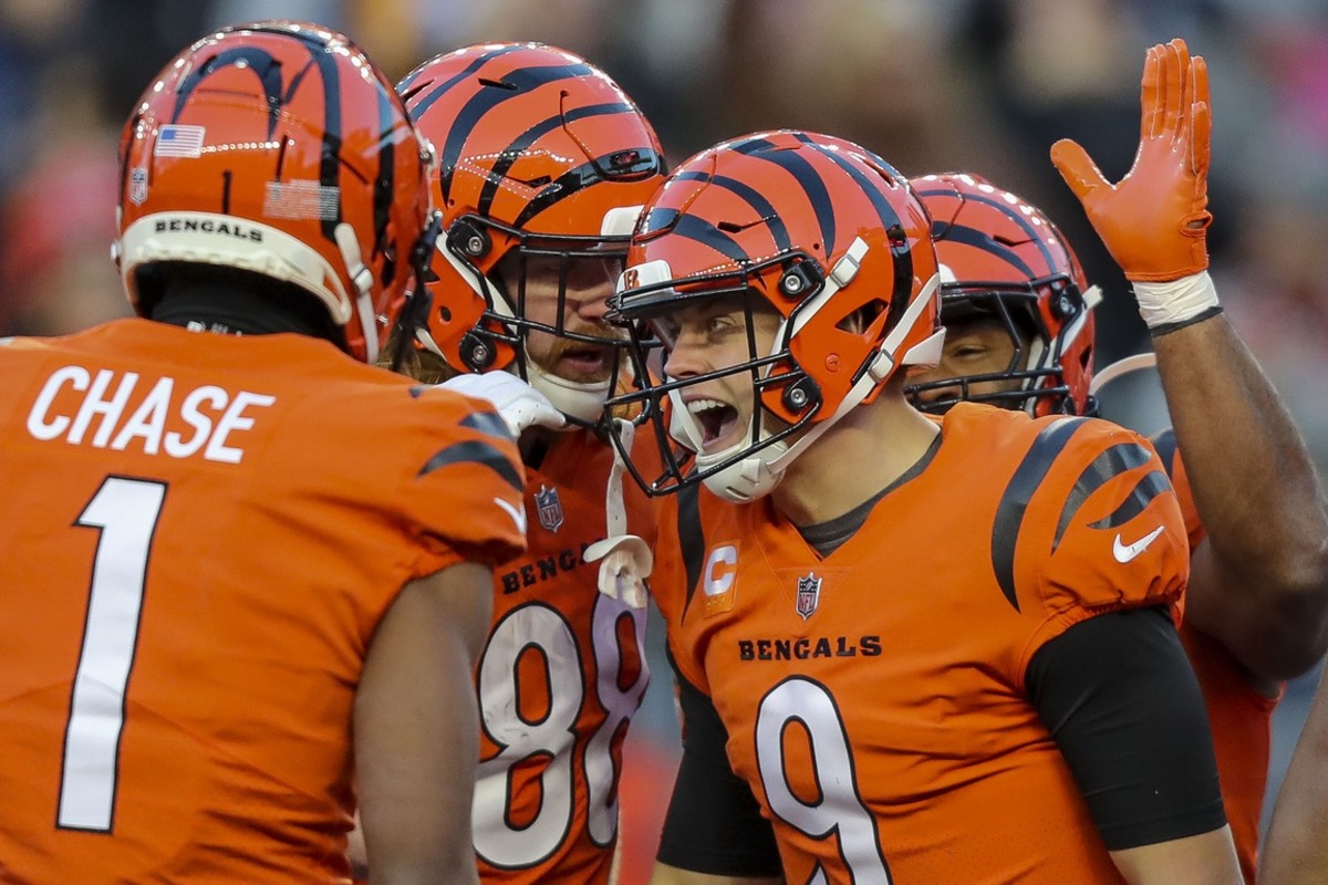 Dec 4, 2022; Cincinnati, Ohio, USA; Cincinnati Bengals quarterback Joe Burrow (9) celebrates with teammates after scoring a touchdown against the Kansas City Chiefs in the first half at Paycor Stadium. Mandatory Credit: Katie Stratman-USA TODAY Sports