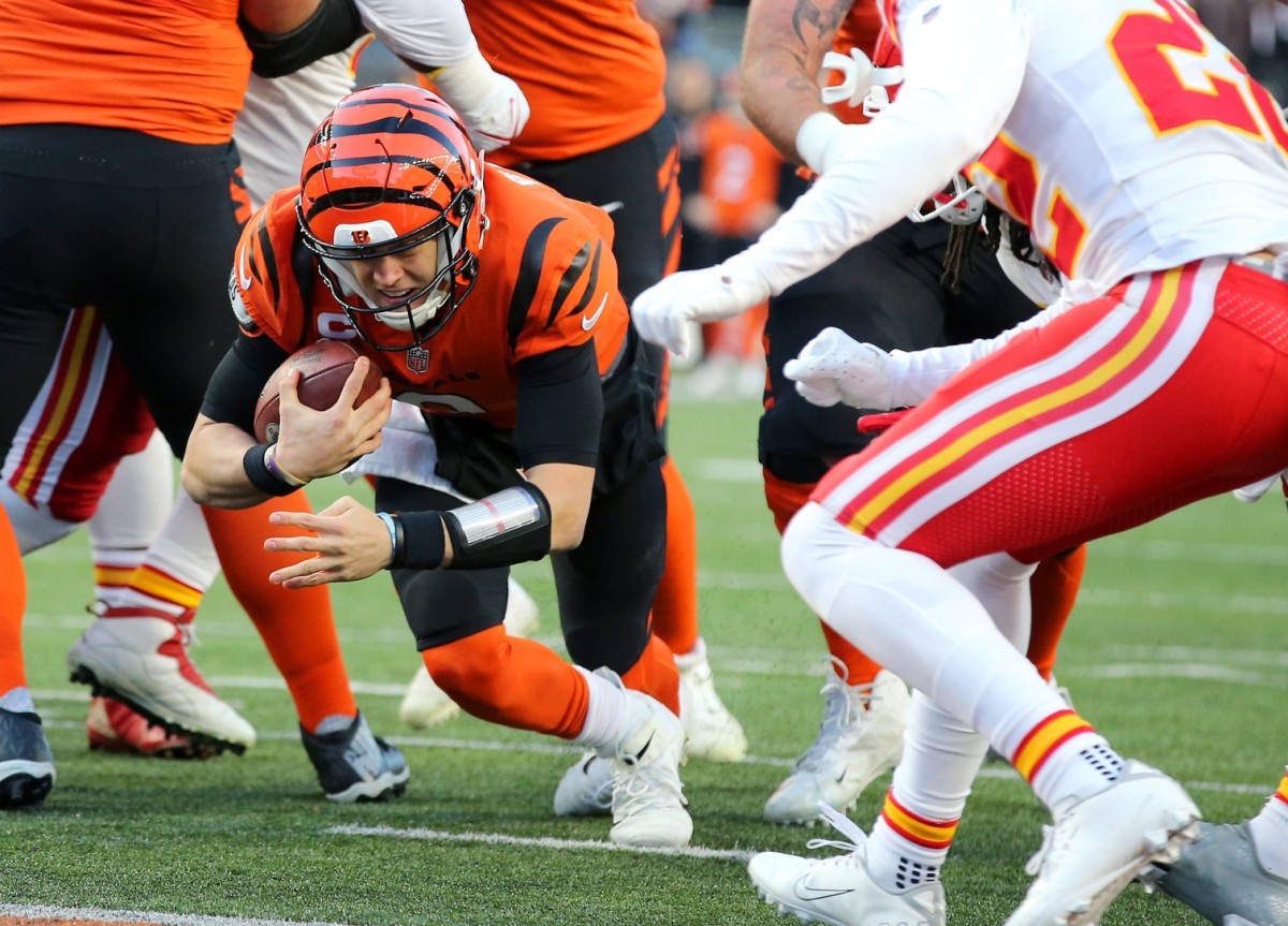 Bengals quarterback Joe Burrow scores on a four-yard run during Cincinnati's win over the Chiefs in Week 13.