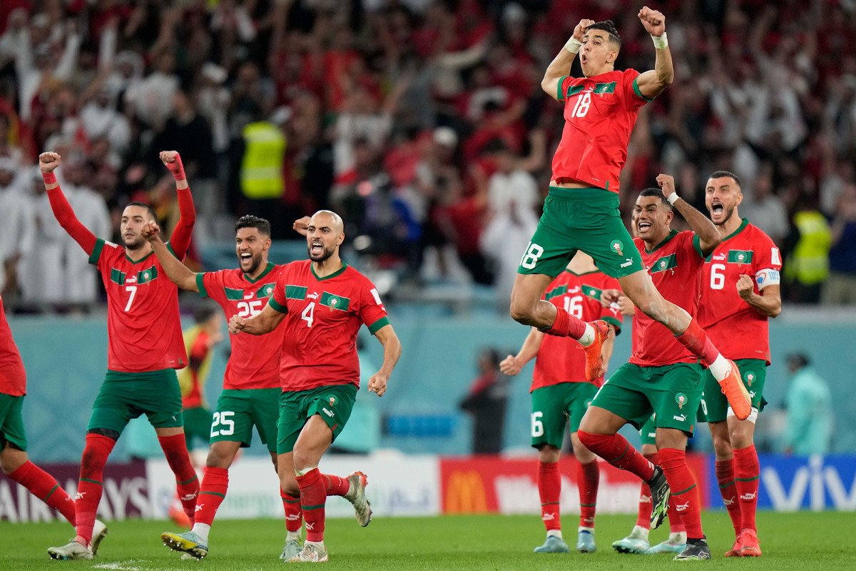 Morocco celebrates its win in penalty kicks over Spain at the World Cup