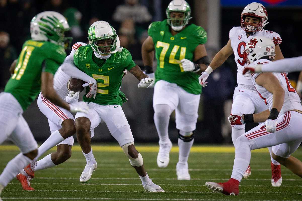 Utah's Zemaiah Vaughn strips the ball from Oregon wide receiver Dont e Thornton as the No. 12 Oregon Ducks host the No. 10 Utah Utes in Oregon s final home game of the season at Autzen Stadium in Eugene, Ore.