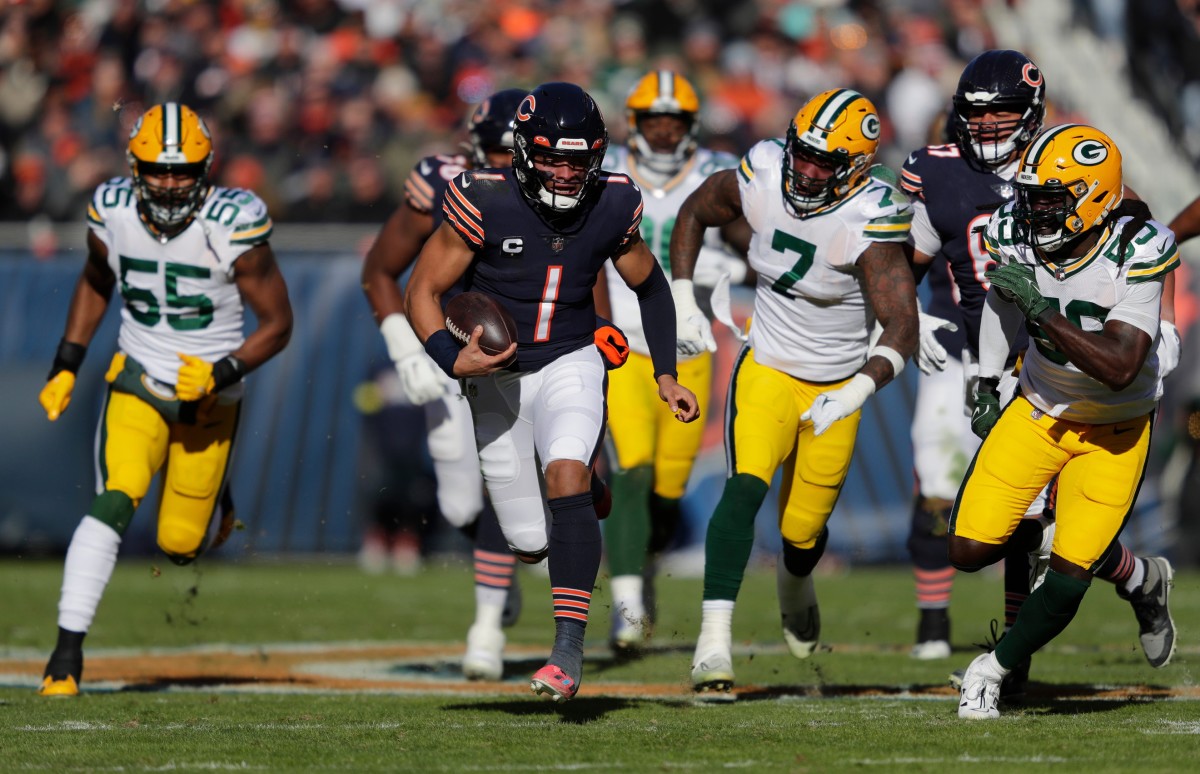 Bears quarterback Justin Fields breaks away for a touchdown against the Packers in Week 13.