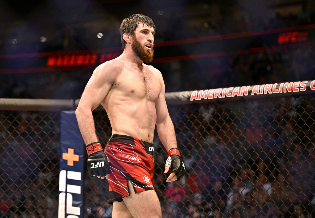 Magomed Ankalaev (red gloves) reacts after defeating Anthony Smith (not pictured) in a light heavyweight bout during UFC 277 at the American Airlines Center.