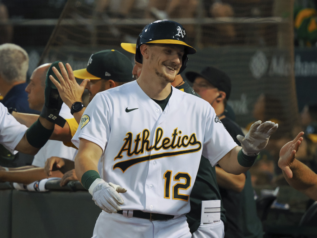 Oakland Athletics catcher Sean Murphy celebrates with teammates after hitting a two-run home run. (2022)
