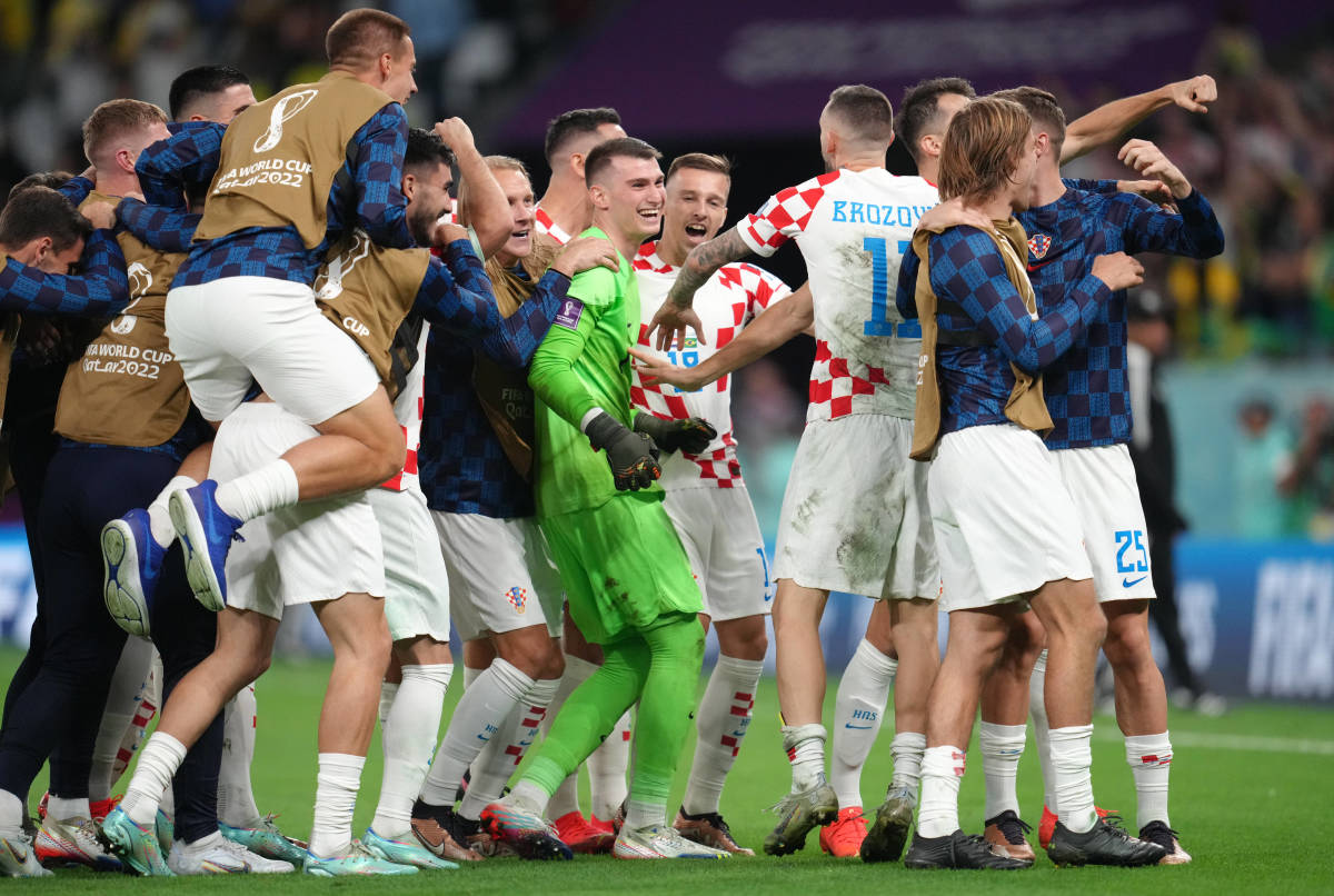 Croatia's players pictured celebrating after beating Brazil in a penalty shootout in the quarter-finals of the 2022 FIFA World Cup in Qatar
