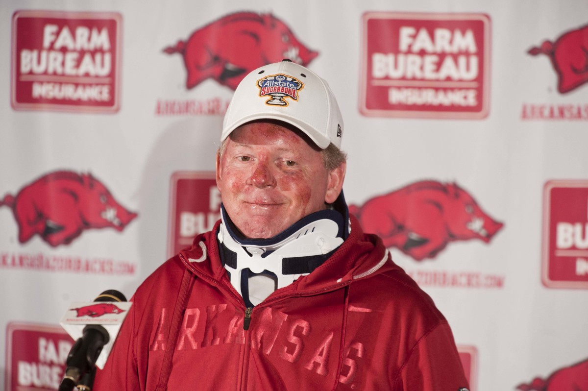 Former Arkansas coach Bobby Petrino addressing the media after his motorcycle crash in 2012. 