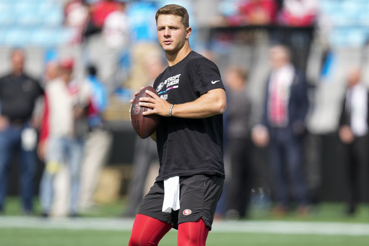 Brock Purdy warms up before a 49ers game