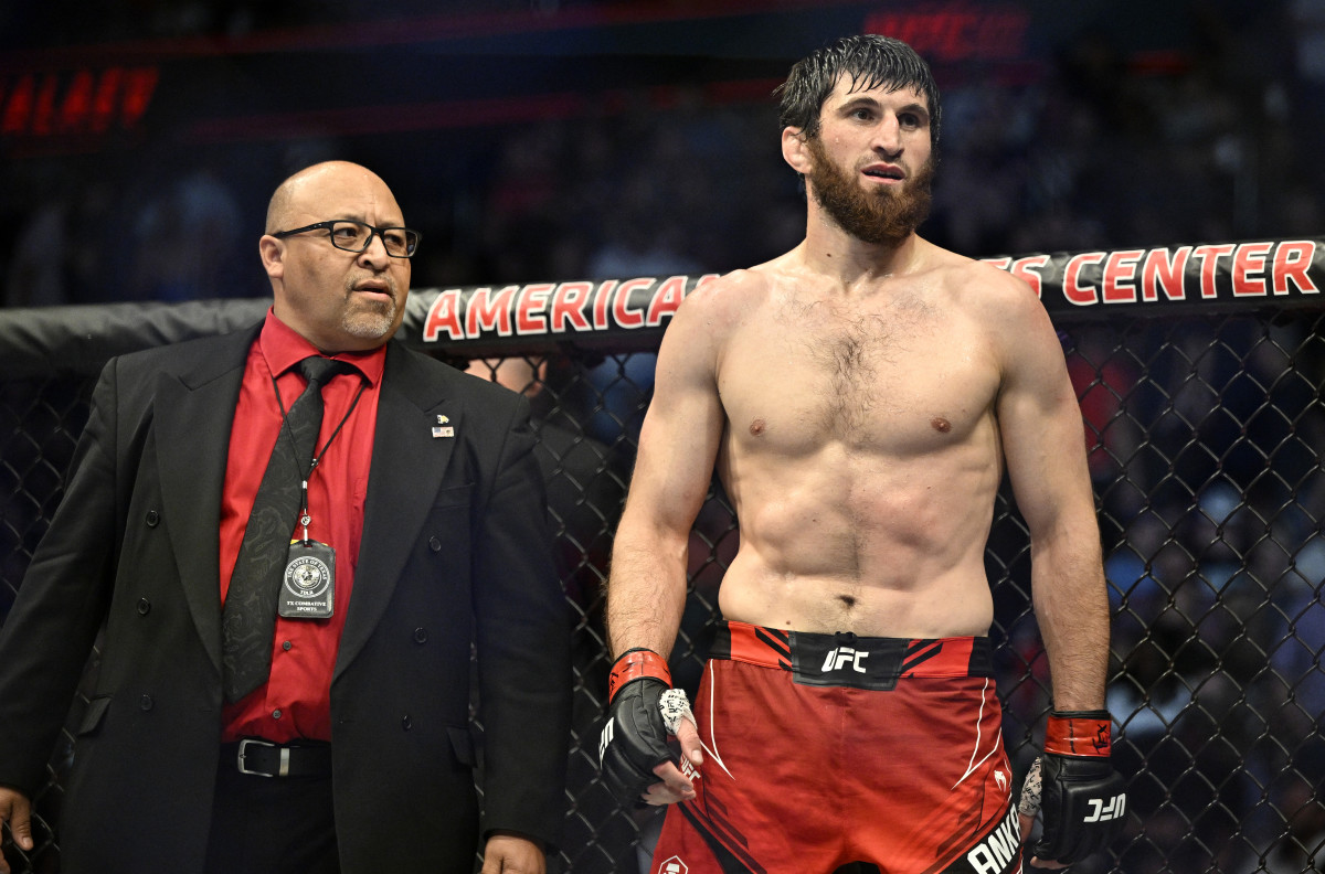 Magomed Ankalaev (red gloves) reacts after defeating Anthony Smith (not pictured) in a light heavyweight bout during UFC 277 at the American Airlines Center.