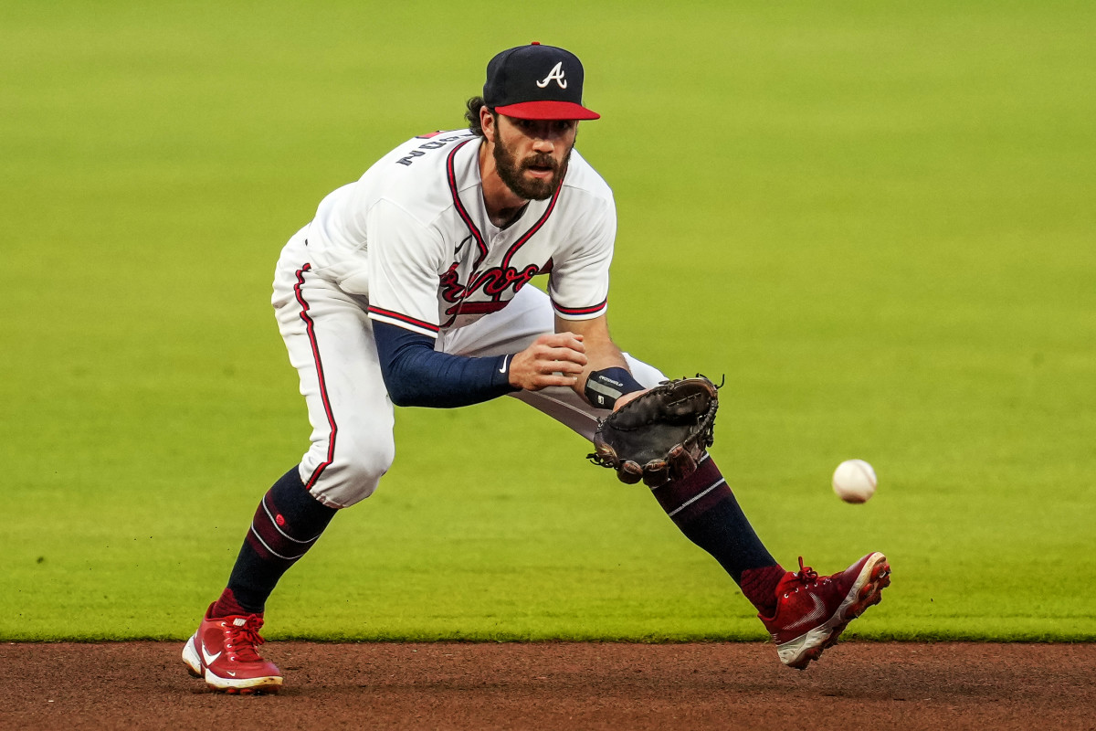 Braves shortstop Dansby Swanson fields a ground ball.