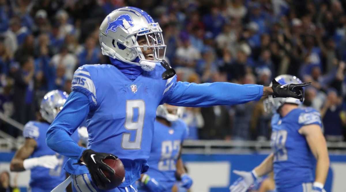 Lions wide receiver Jameson Williams celebrates his first career NFL touchdown.