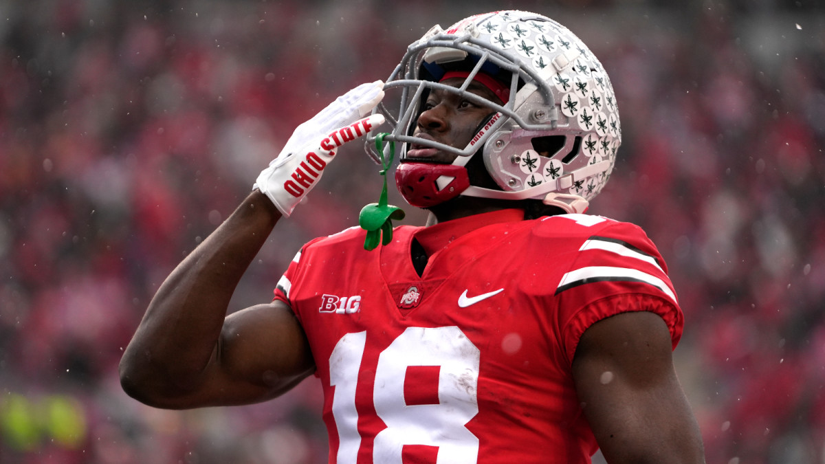 Nov 12, 2022; Columbus, Ohio, USA; Ohio State Buckeyes wide receiver Marvin Harrison Jr. (18) celebrates a touchdown in the second quarter of their NCAA Division I football game between the Ohio State Buckeyes and the Indiana Hoosiers at Ohio Stadium.