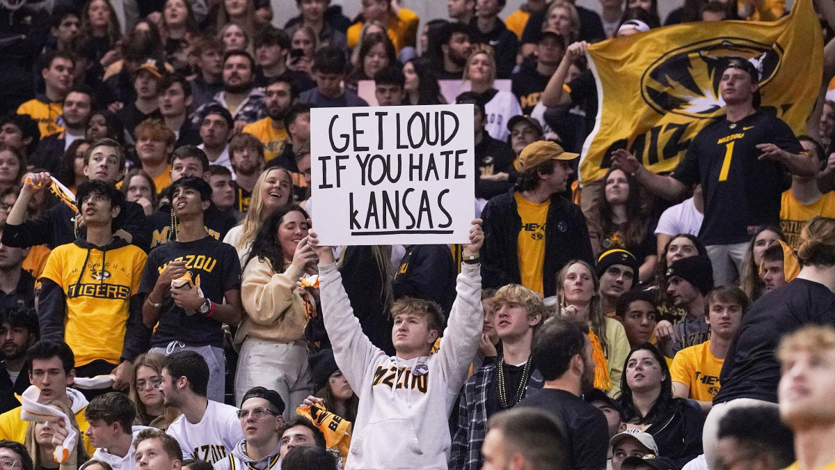 A Missouri fan holds a “Get Loud If You Hate Kansas” sign