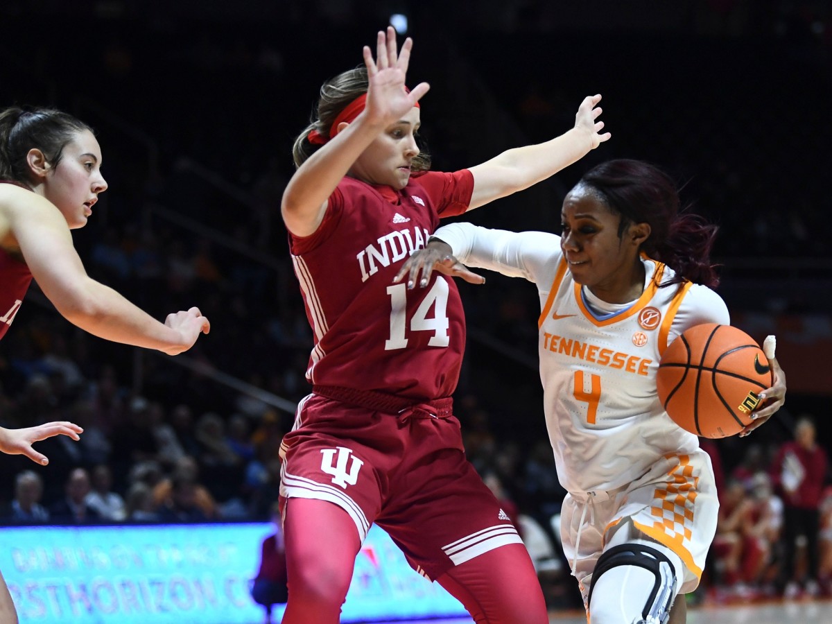 Tennessee guard Jordan Walker (4) tries to get past Indiana guard Sara Scalia (14) during an NCAA college basketball game between the Tennessee Lady Vols and Indiana Hoosiers on Monday, November 14, 2022 in Knoxville, Tenn.