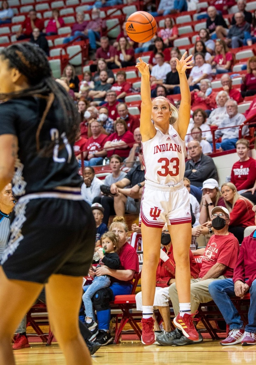 Indiana's Sydney Parrish (33) shoots a three-pointer during the Indiana versus Kentucky Wesleyan women's basketball game at Simon Skjodt Assembly Hall on Friday, Nov. 4, 2022.