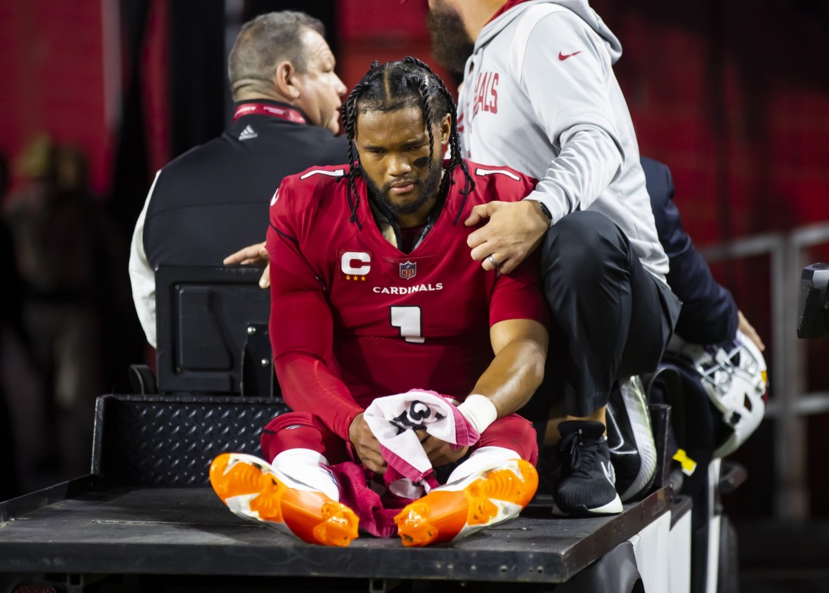 Cardinals quarterback Kyler Murray leaves on a cart after suffering a knee injury against the Patriots in Week 14.