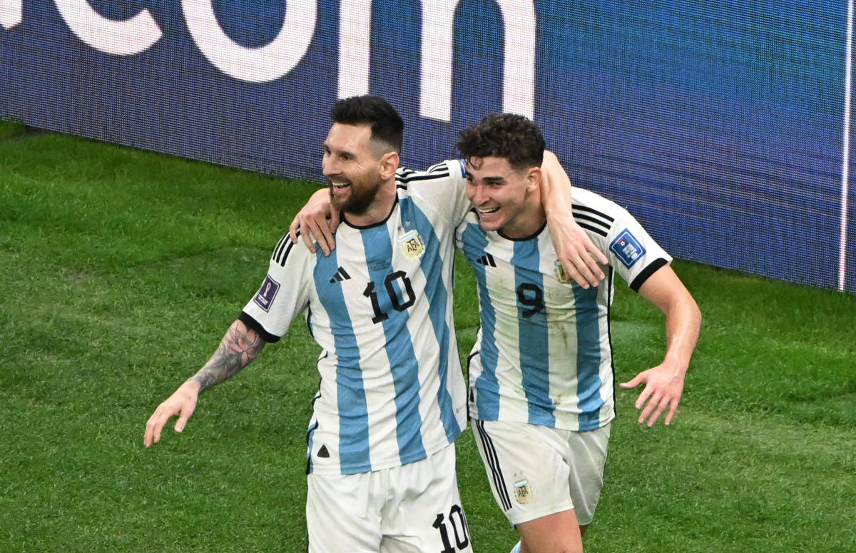 Lionel Messi (left) and Julian Alvarez pictured celebrating during Argentina's win over Croatia in their 2022 World Cup semi-final