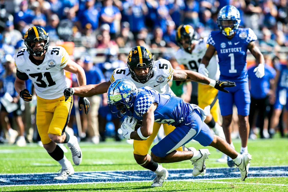Iowa Hawkeyes linebacker Jestin Jacobs (5) makes a tackle against the Kentucky Wildcats.