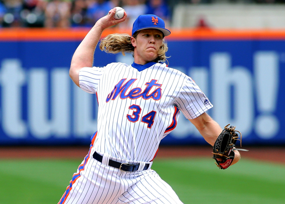 Former Mets righthander Noah Syndergaard pitches against the Cubs during the first inning at Citi Field in 2016.