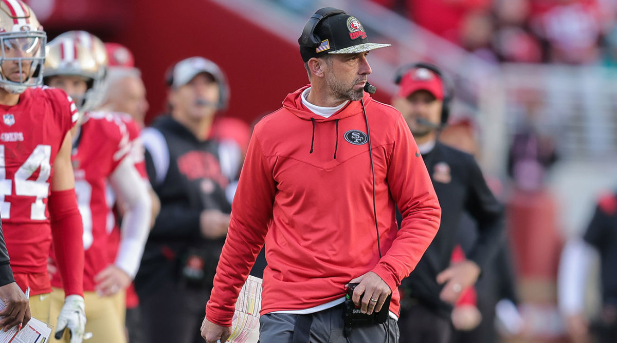 Kyle Shanahan looks out at field from the 49ers sideline