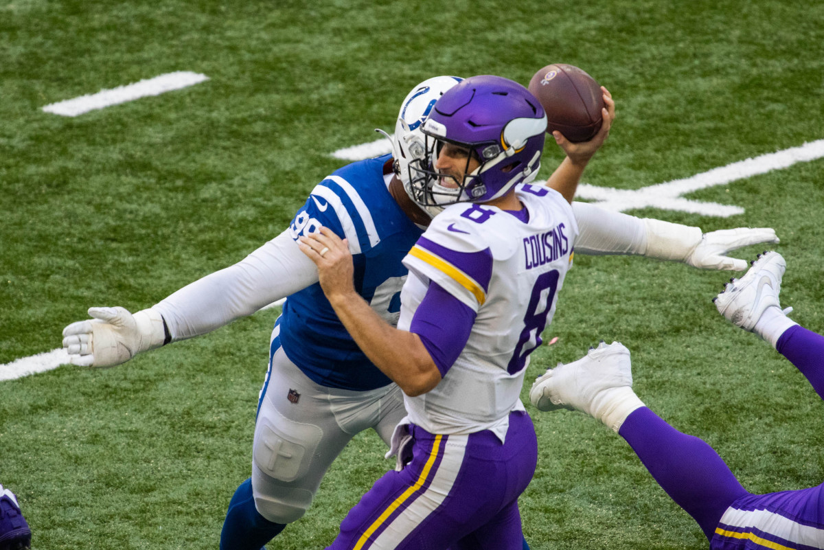 Sep 20, 2020; Indianapolis, Indiana, USA; Indianapolis Colts defensive tackle DeForest Buckner (99) tackles Minnesota Vikings quarterback Kirk Cousins (8) in the game at Lucas Oil Stadium. Mandatory Credit: Trevor Ruszkowski-USA TODAY Sports