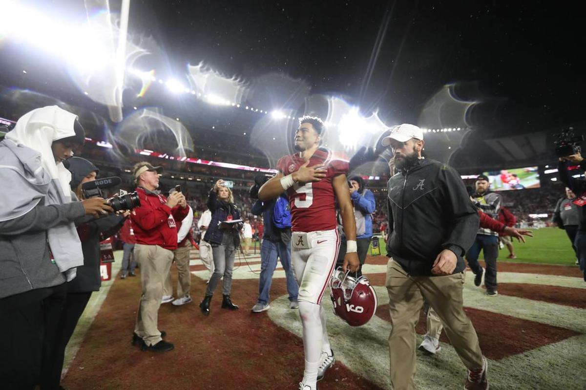 Alabama quarterback Bryce Young (9) walks off the field after the Crimson Tide's 49-27 win over the Auburn Tigers on Nov. 26 at Bryant-Denny Stadium in Tuscaloosa, Ala.