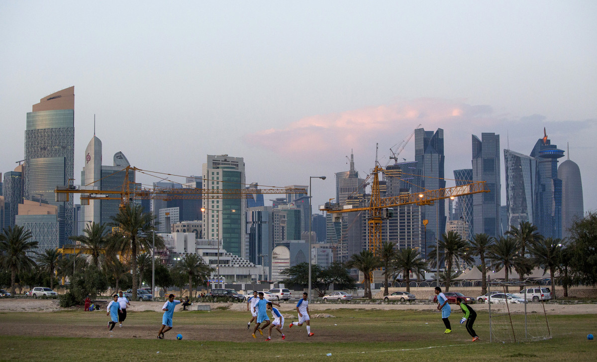 In 2016, as Doha grew behind them, Migrant workers played soccer on the smallest of stages.