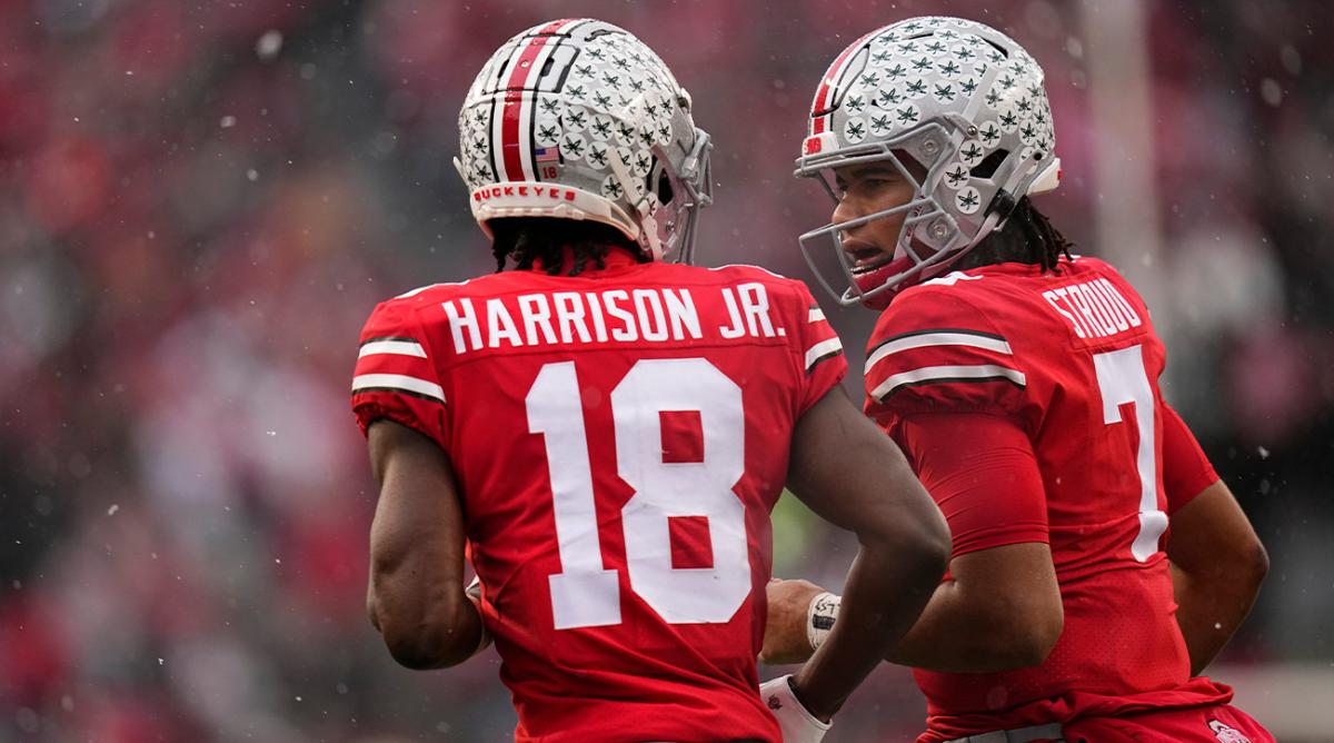 Nov 12, 2022; Columbus, Ohio, USA; Ohio State Buckeyes quarterback C.J. Stroud (7) celebrates a touchdown by wide receiver Marvin Harrison Jr. (18) during the first half of the NCAA football game against the Indiana Hoosiers at Ohio Stadium.