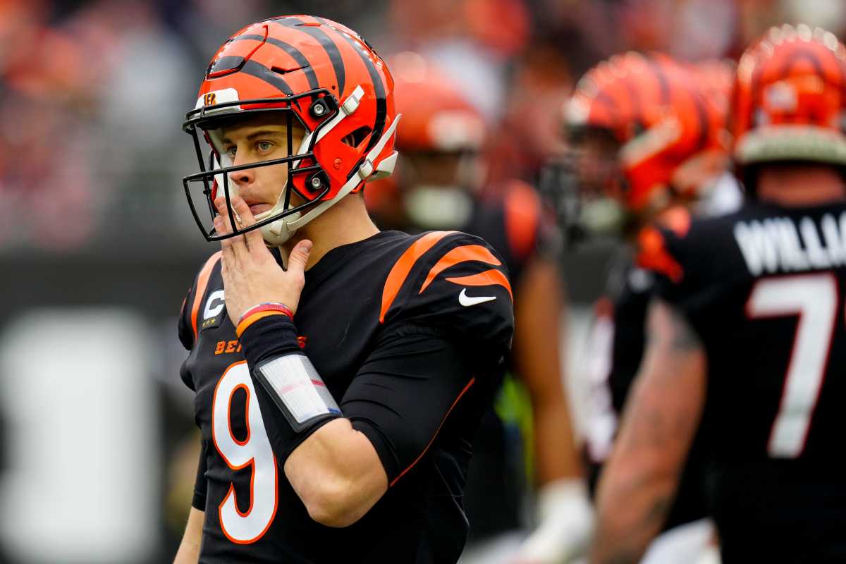 Cincinnati Bengals quarterback Joe Burrow (9) resets between plays in the second quarter of the NFL Week 14 game between the Cincinnati Bengals and the Cleveland Browns at Paycor Stadium in Cincinnati on Sunday, Dec. 11, 2022. The Bengals led 13-3 at halftime. Cleveland Browns At Cincinnati Bengals Week 14