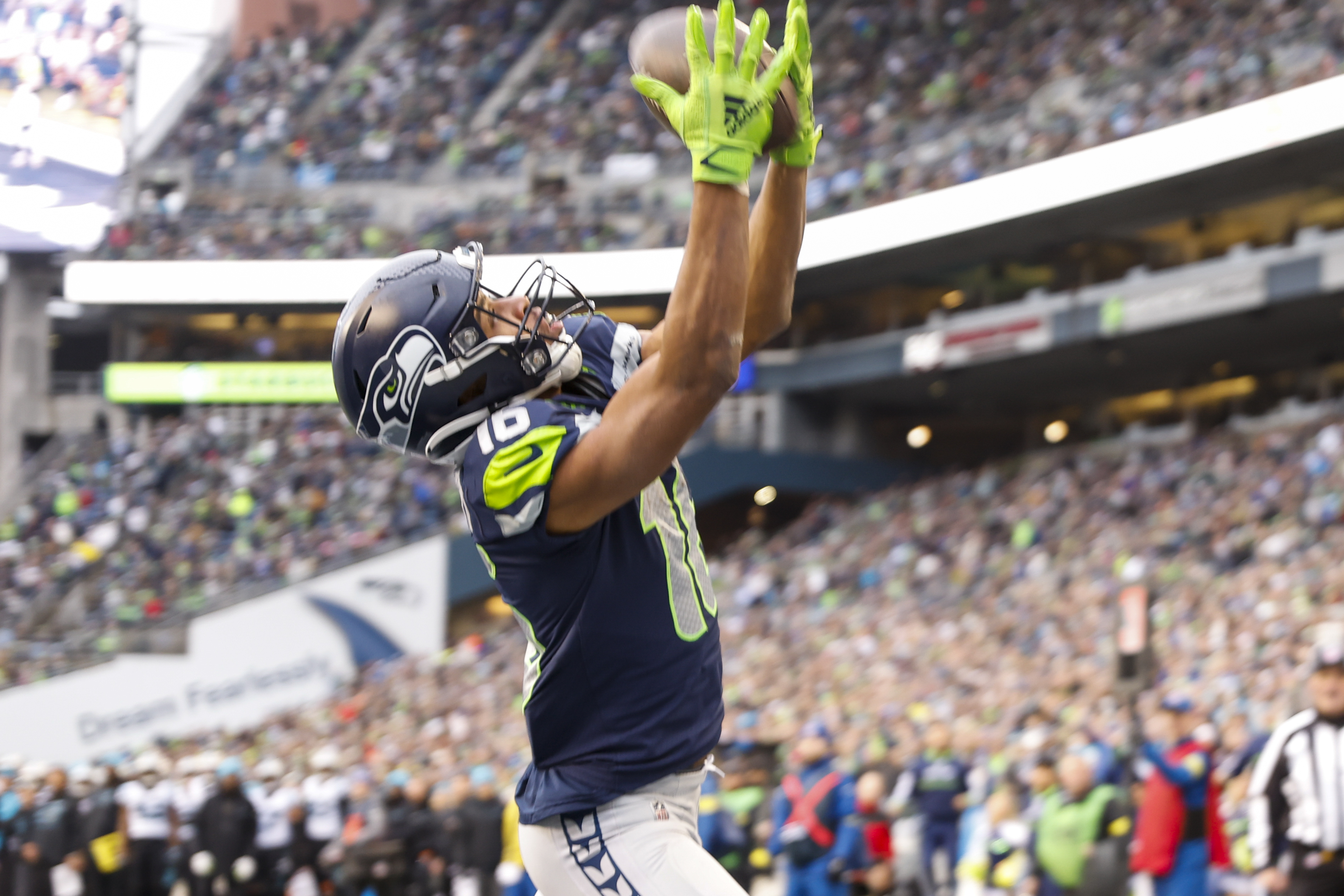 Seattle Seahawks wide receiver Tyler Lockett (16) catches a touchdown against the Carolina Panthers during the second quarter at Lumen Field.