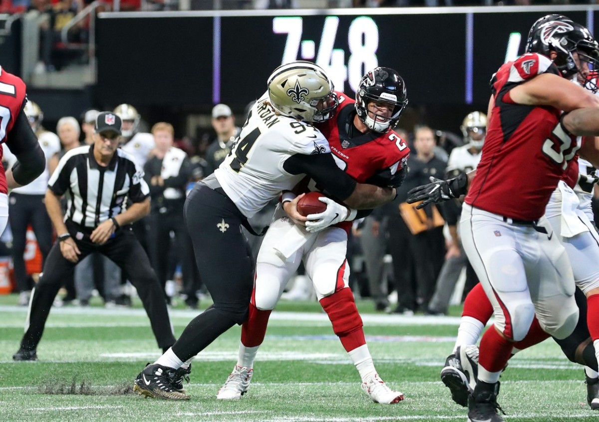 Sep 23, 2018; Atlanta Falcons quarterback Matt Ryan (2) gets sacked by New Orleans Saints defensive end Cameron Jordan (94). Mandatory Credit: Jason Getz-USA TODAY Sports