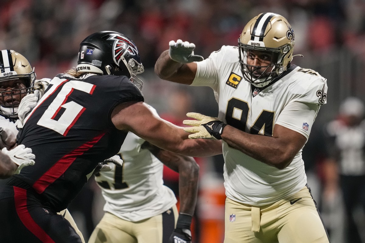 Jan 9, 2022; New Orleans Saints defensive end Cameron Jordan (94) rushes the passer against Atlanta Falcons offensive tackle Kaleb McGary (76). Mandatory Credit: Dale Zanine-USA TODAY