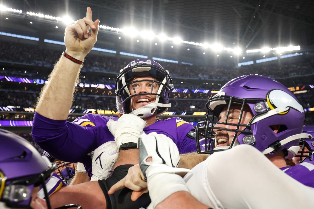 Vikings kicker Greg Joseph celebrates after his 40-yard field goal gave Minnesota the greatest comeback in NFL history.