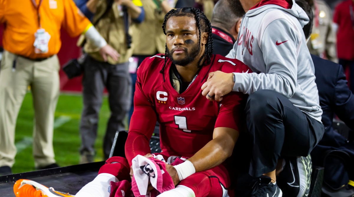 Cardinals quarterback Kyler Murray reacts after suffering an injury during a game against the Patriots.