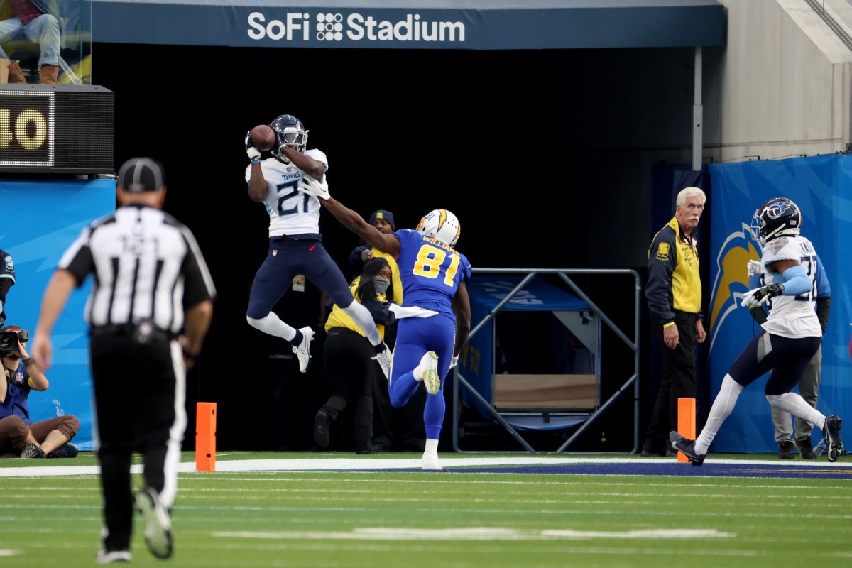 Tennessee Titans cornerback Roger McCreary (21) intercepts a pass for a touchback during the second quarter against the Los Angeles Chargers at SoFi Stadium.