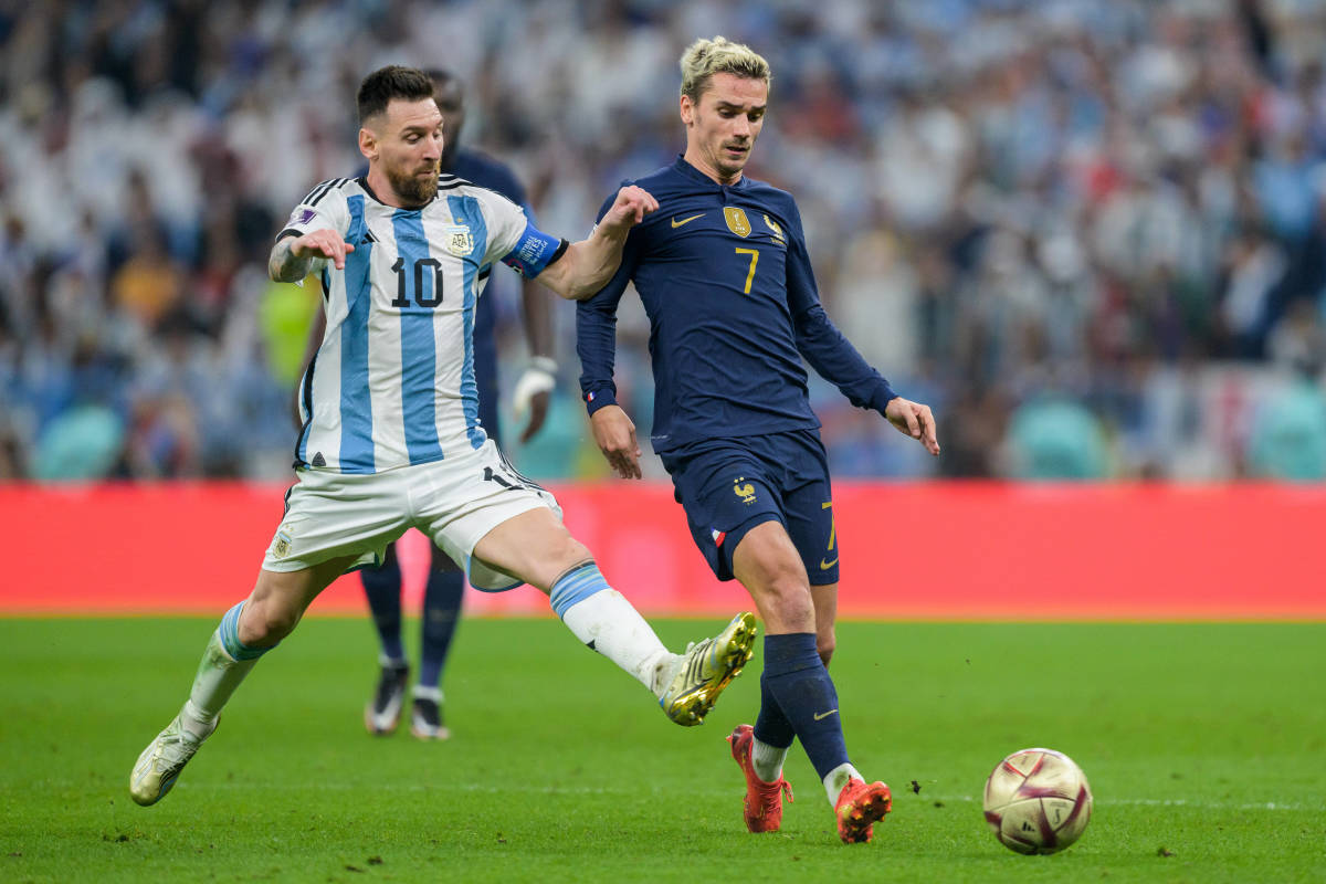 Lionel Messi (left) and Antoine Griezmann pictured during the 2022 FIFA World Cup final