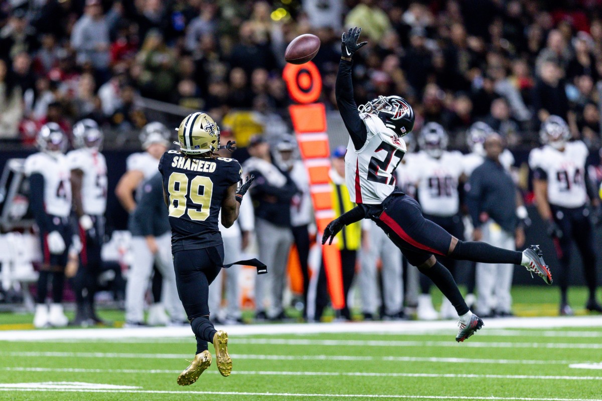 New Orleans Saints wide receiver Rashid Shaheed (89) catches a pass over Atlanta Falcons safety Richie Grant (27). Mandatory Credit: Stephen Lew-USA TODAY 