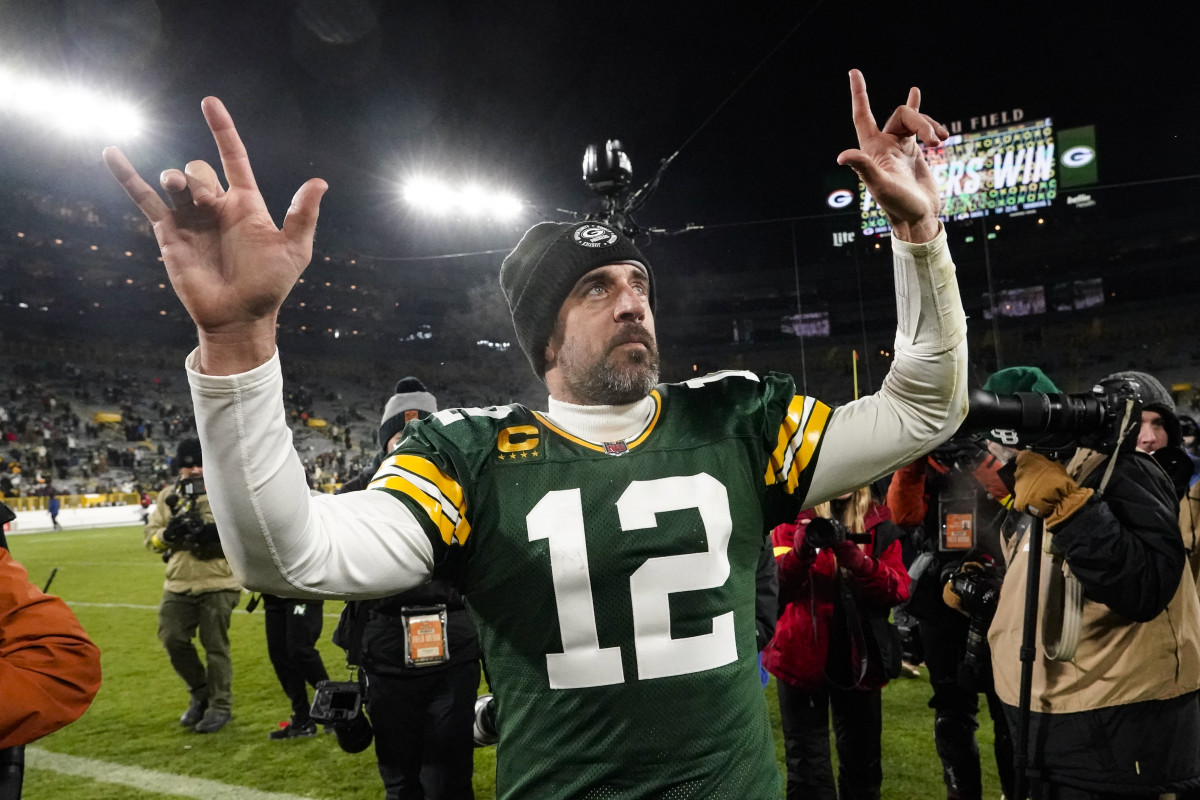Green Bay Packers quarterback Aaron Rodgers (12) waves to fans as he leaves the field following an NFL football game against the Los Angeles Rams in Green Bay, Wis. Monday, Dec. 19, 2022. The Packers defeated the Rams 24-12.