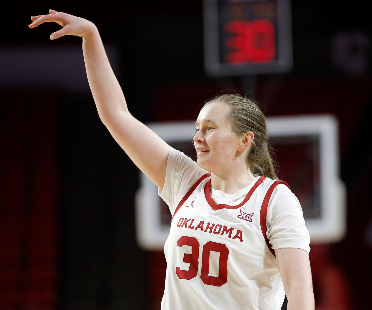 Oklahoma’s Taylor Robertson reacts after a 3-point basket in the first half during the college women’s basketball game between the Sooners and Northwestern State.