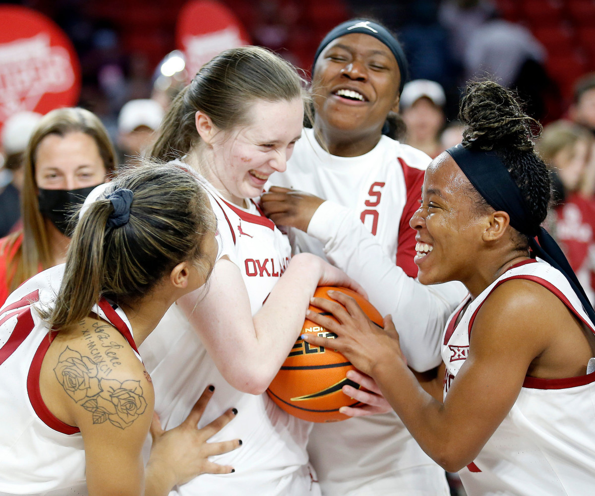 OU’s Taylor Robertson celebrates breaking the Big 12 women’s record for most career 3-pointers after beating Baylor 83-77.