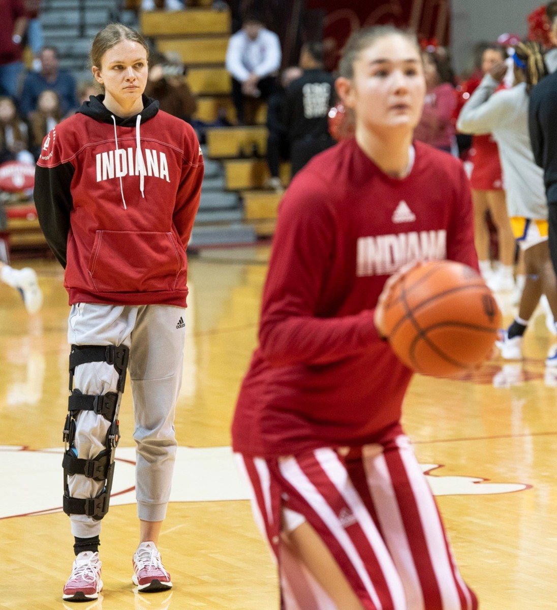 Indiana's Grace Berger (34) watches her teammates warm up before the Indiana versus Morehead State women's basketball game at Simon Skjodt Assembly Hall on Sunday, Dec. 18, 2022.