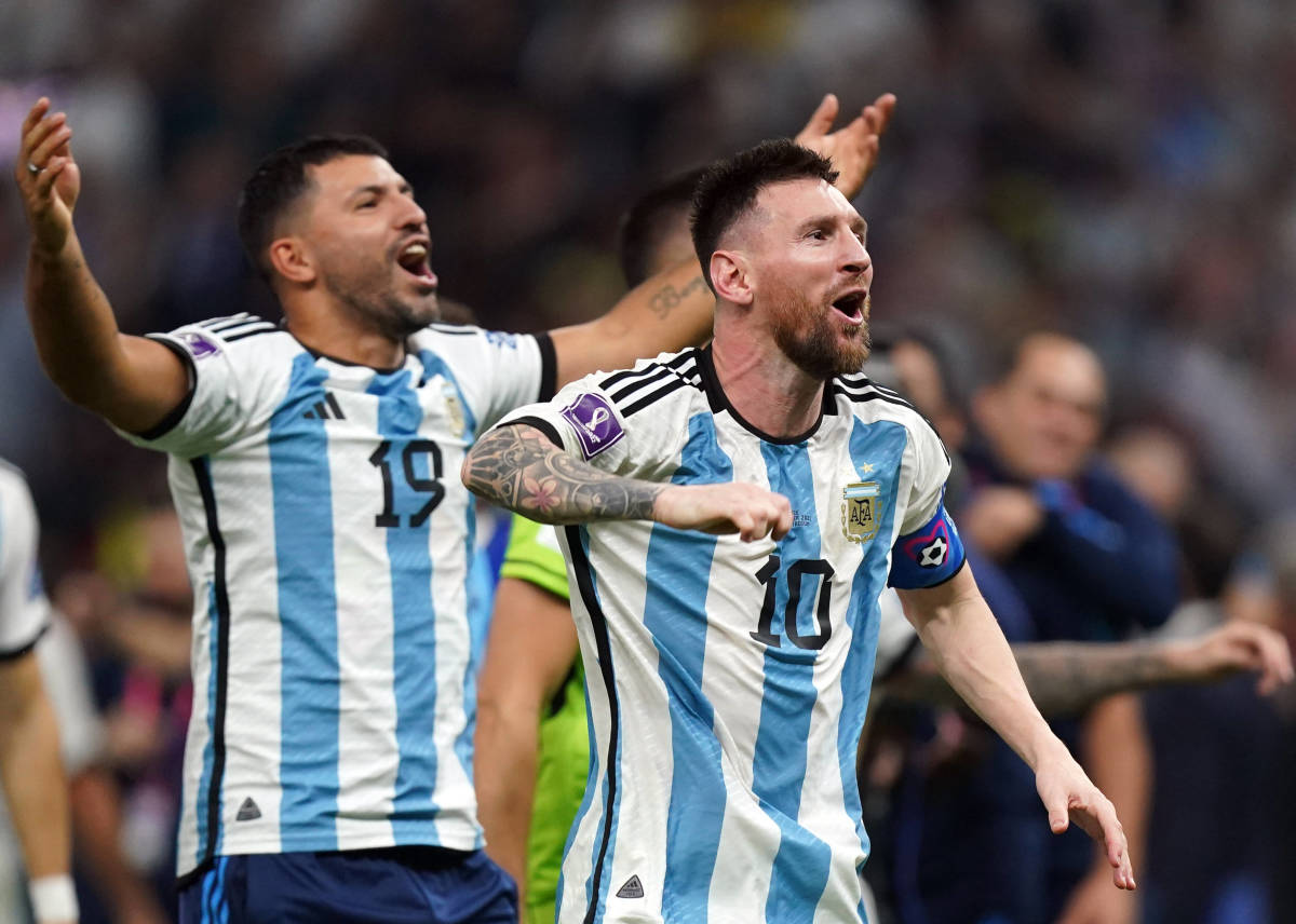 Sergio Aguero (left) and Lionel Messi pictured celebrating after Argentina won the 2022 World Cup in Qatar