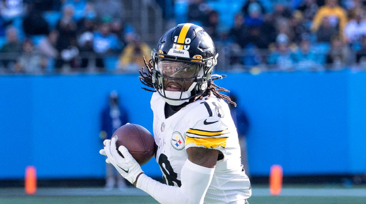 Dec 18, 2022; Charlotte, North Carolina, USA; Pittsburgh Steelers wide receiver Diontae Johnson (18) with the ball in the third quarter at Bank of America Stadium.