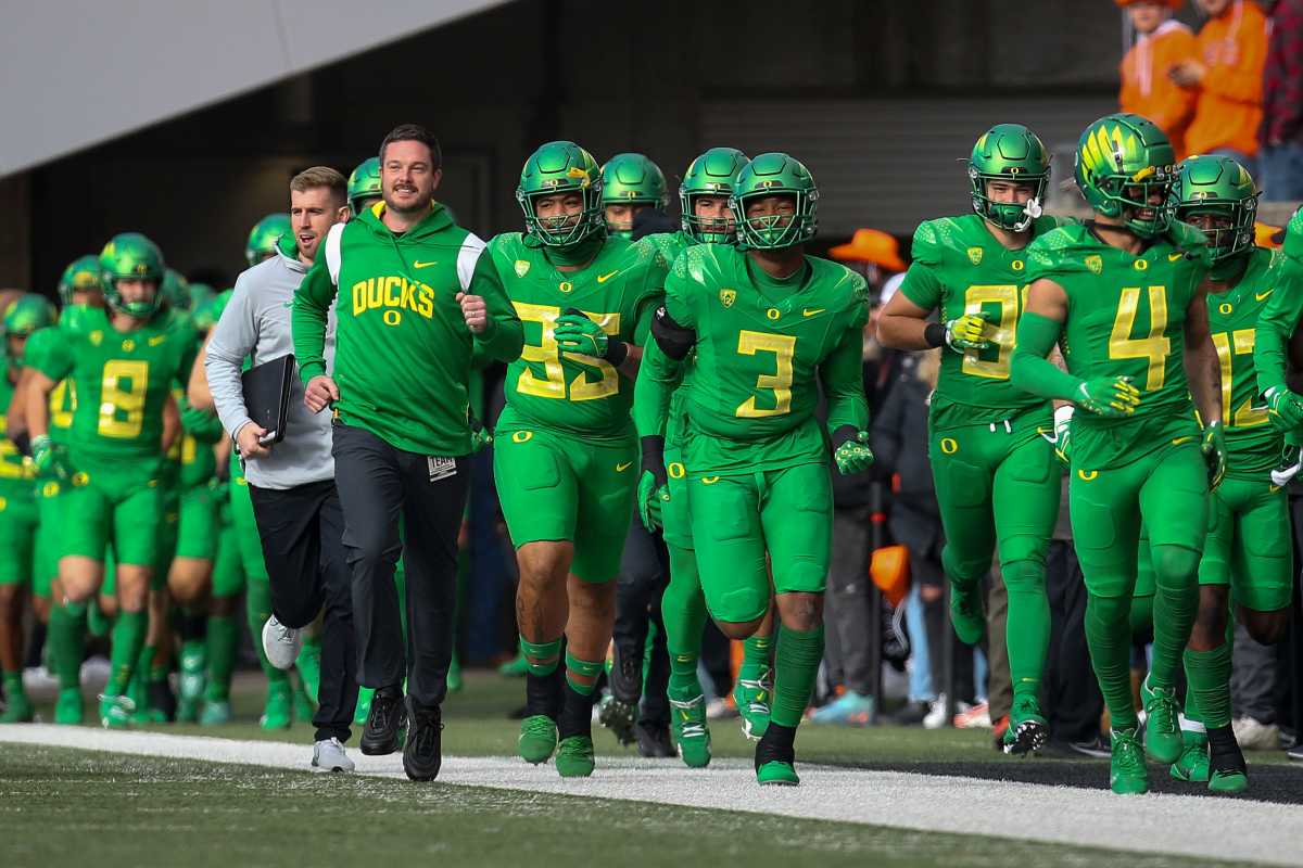 Oregon head coach Dan Lanning takes to the field with his team as the No. 9 Oregon Ducks take on the No. 21 Oregon State Beavers at Reser Stadium in Corvallis, Ore. Saturday, Nov. 26, 2022. Ncaa Football Uo Vs Osu Rivalry Game University Of Oregon At Oregon State