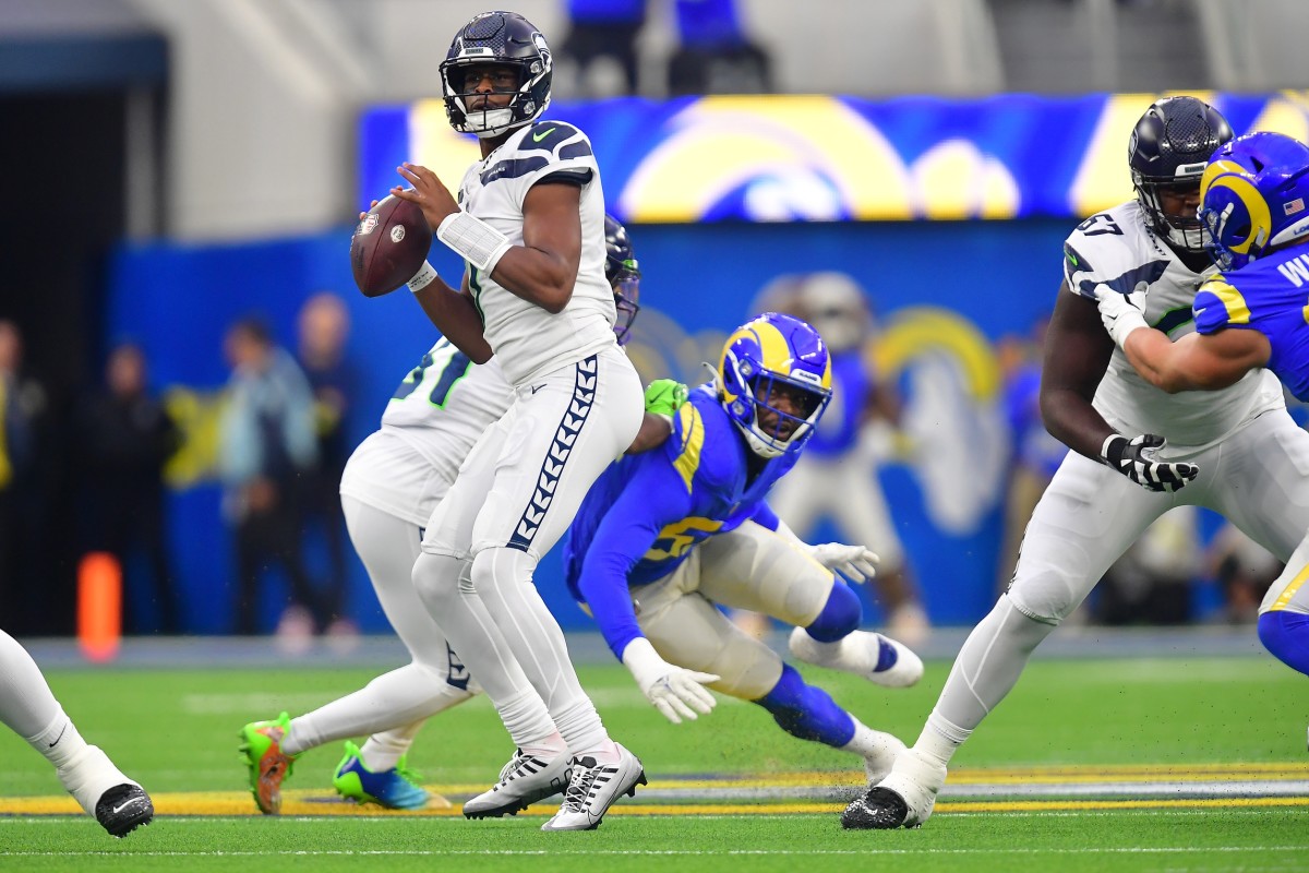 Dec 4, 2022; Inglewood, California, USA; Seattle Seahawks quarterback Geno Smith (7) drops back to pass against the Los Angeles Rams during the first half at SoFi Stadium.