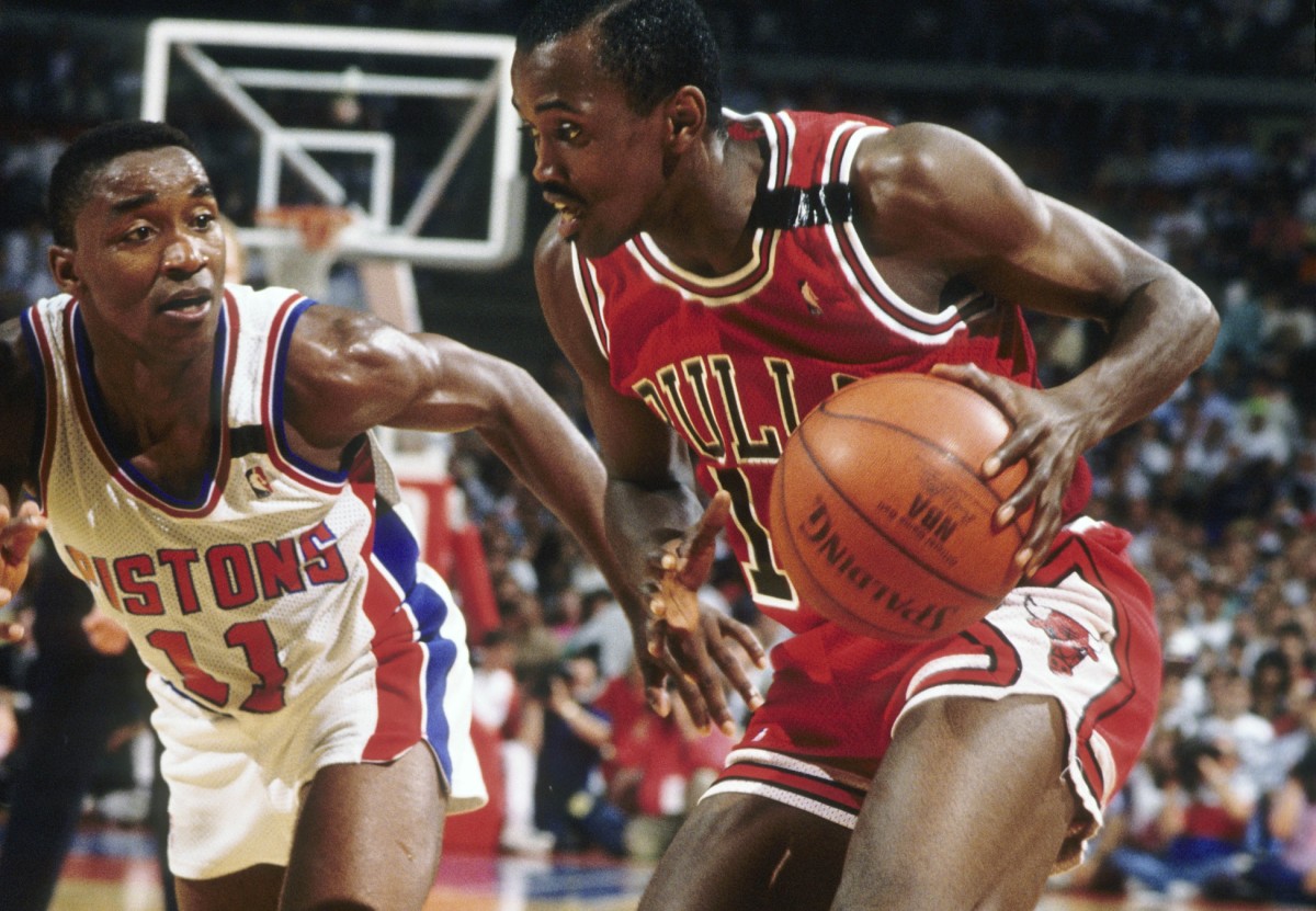 Chicago Bulls guard Craig Hodges (14) is defended by Detroit Pistons guard Isiah Thomas (11)
