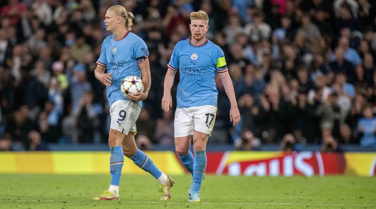 Erling Haaland and Kevin De Bruyne after scoring a goal.